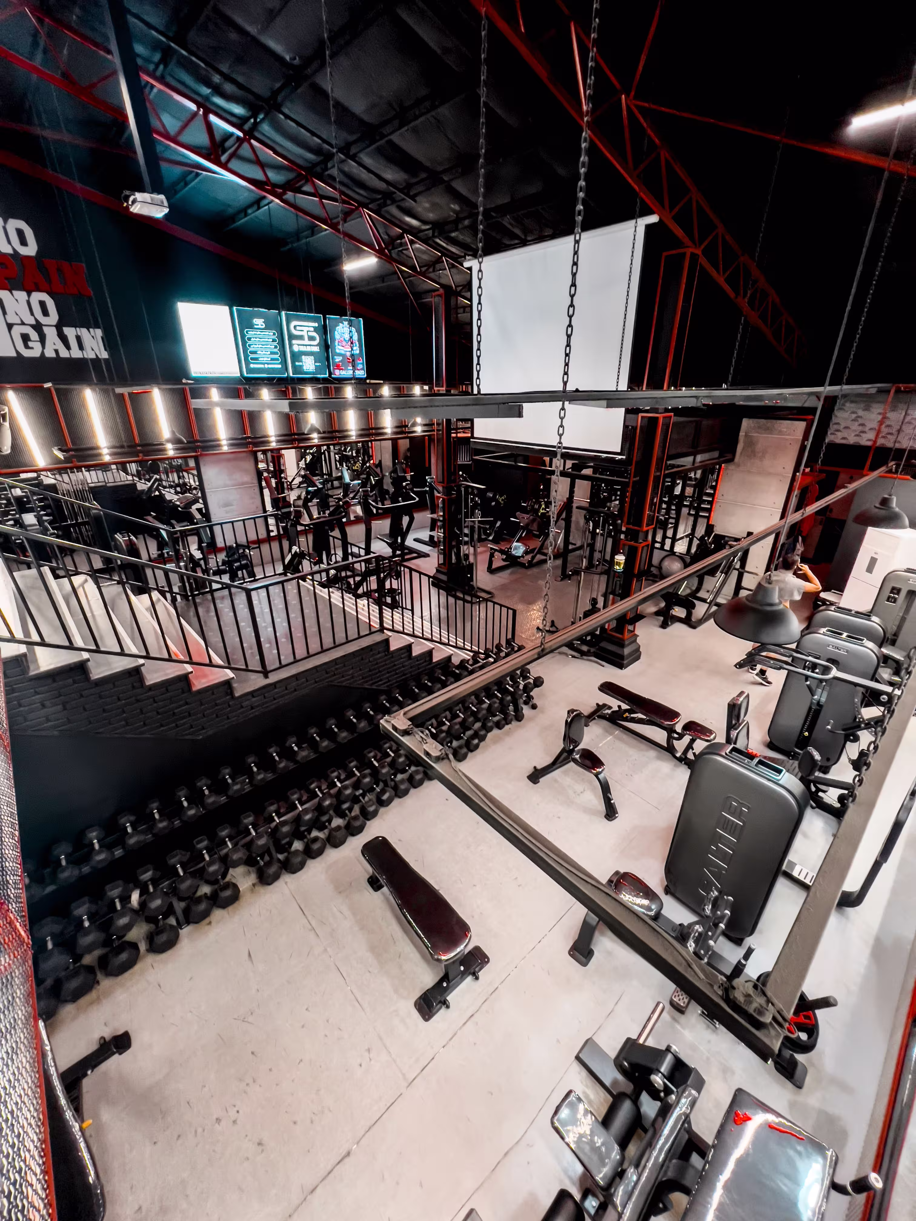 Gym floor with weight racks and open training space